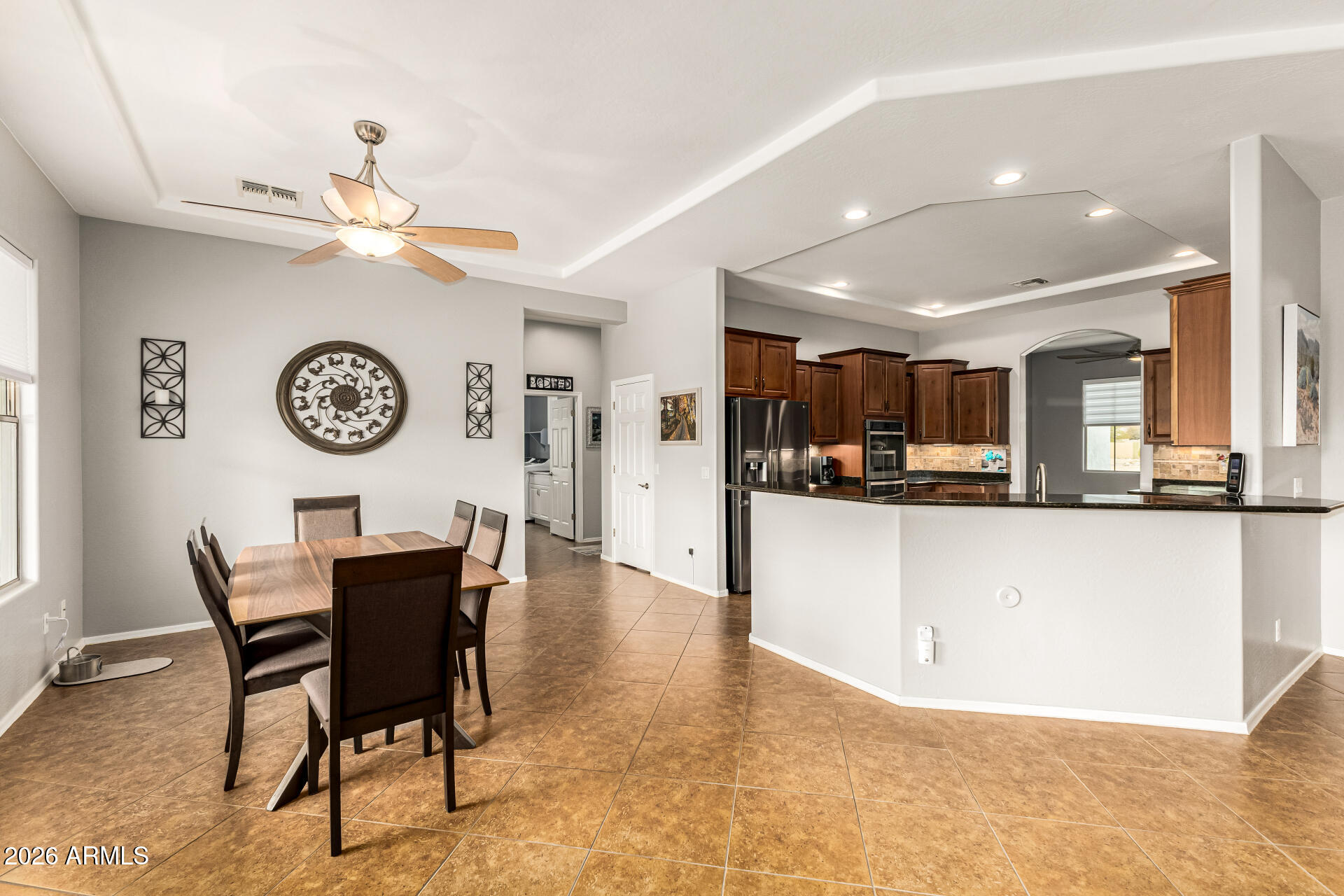 22909 West Sierra Ridge Way Wittmann, AZ 85361 - Photo 34 of 121 BREAKFAST NICHE WITH KITCHEN