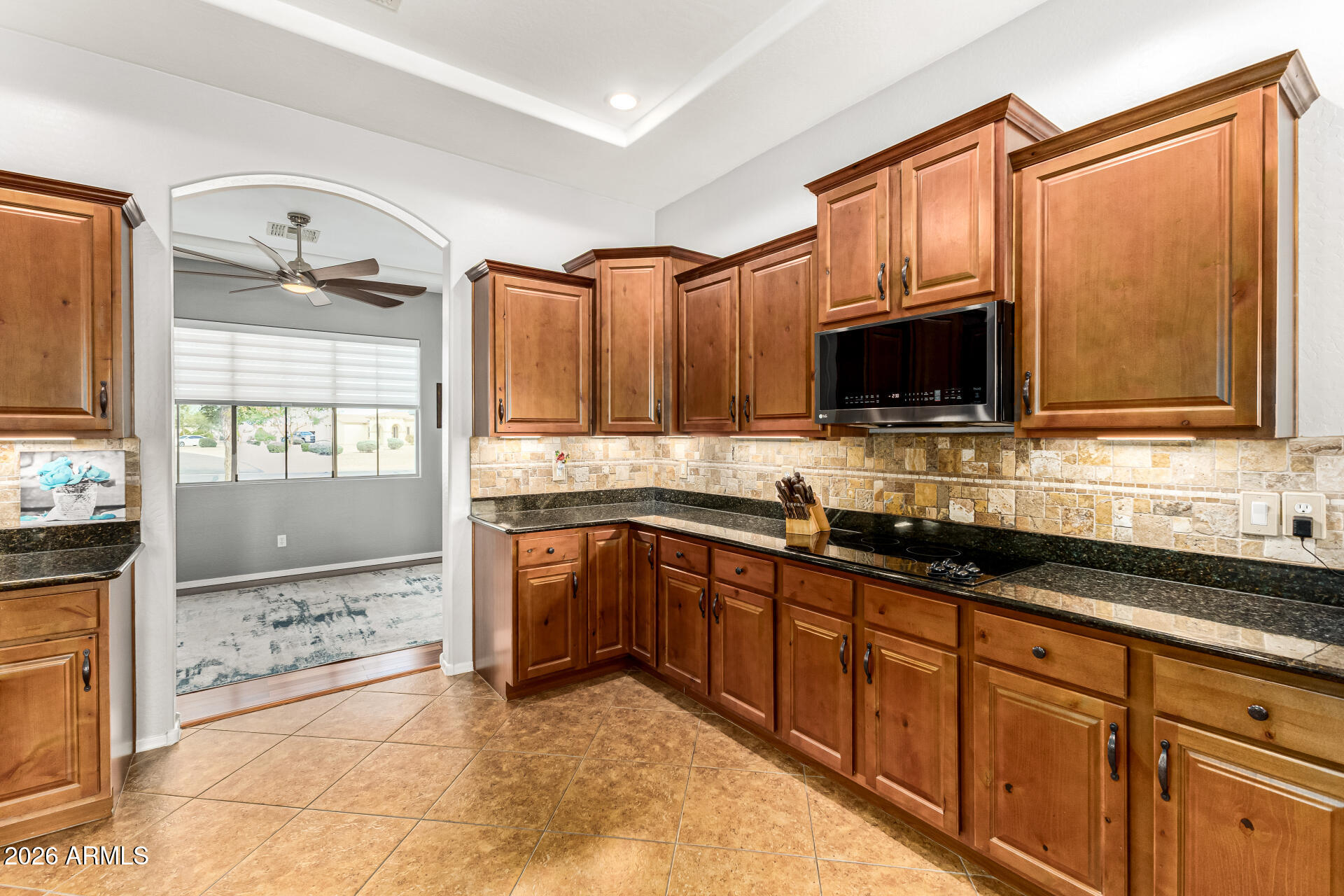 22909 West Sierra Ridge Way Wittmann, AZ 85361 - Photo 38 of 121 KITCHEN TO DINING