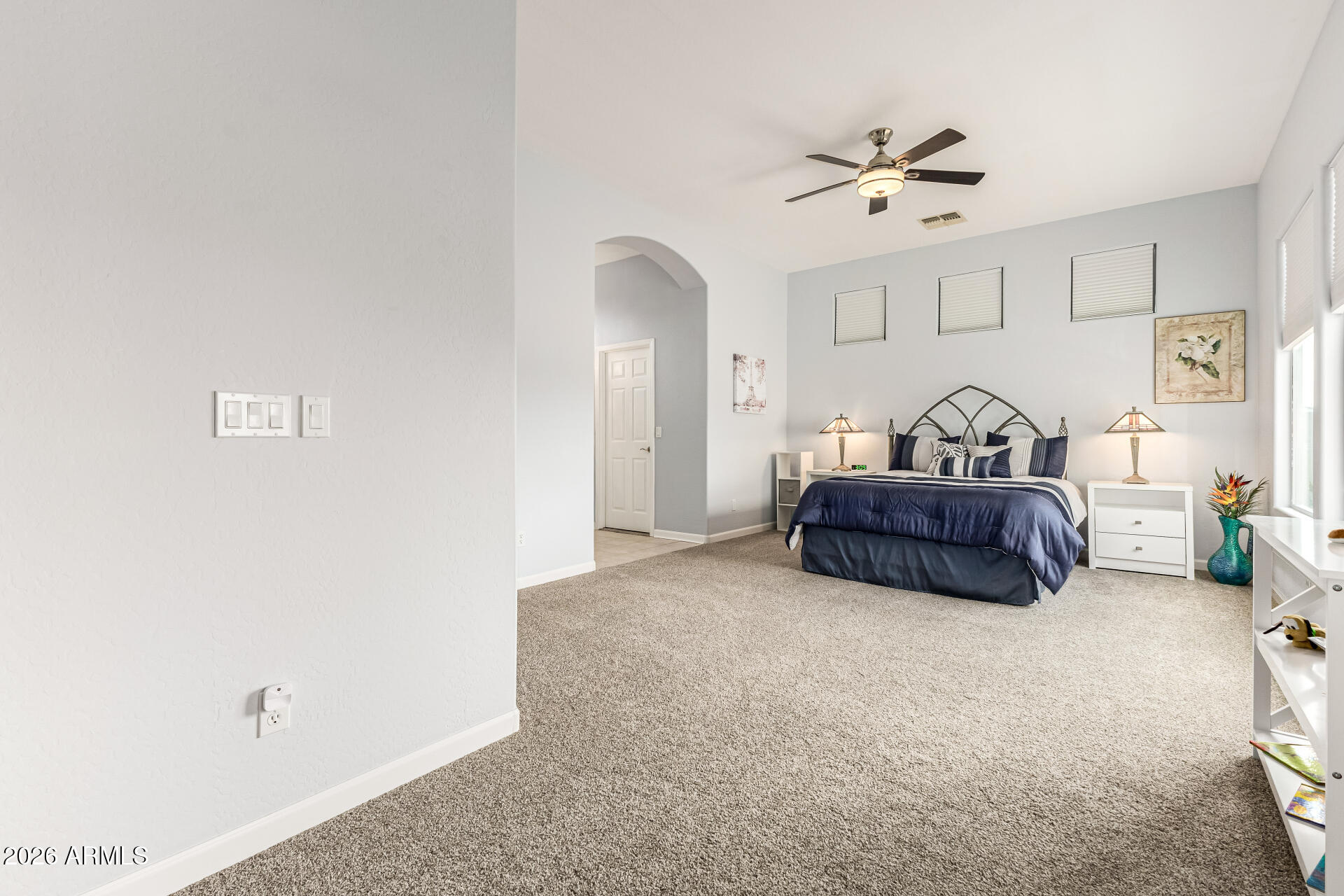 22909 West Sierra Ridge Way Wittmann, AZ 85361 - Photo 48 of 121 a living room with furniture and a ceiling fan