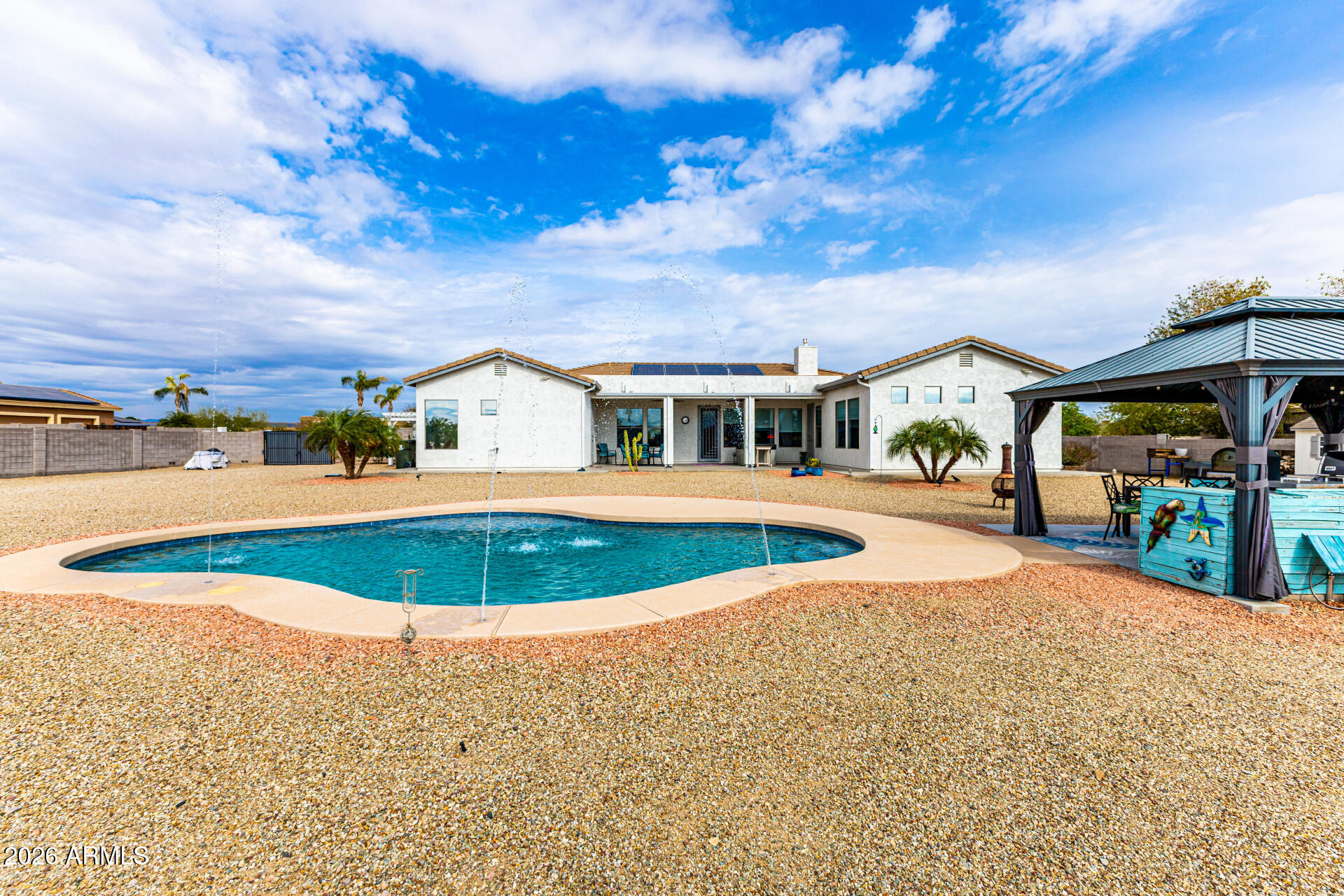 22909 West Sierra Ridge Way Wittmann, AZ 85361 - Photo 5 of 121 a view of outdoor space yard and swimming pool