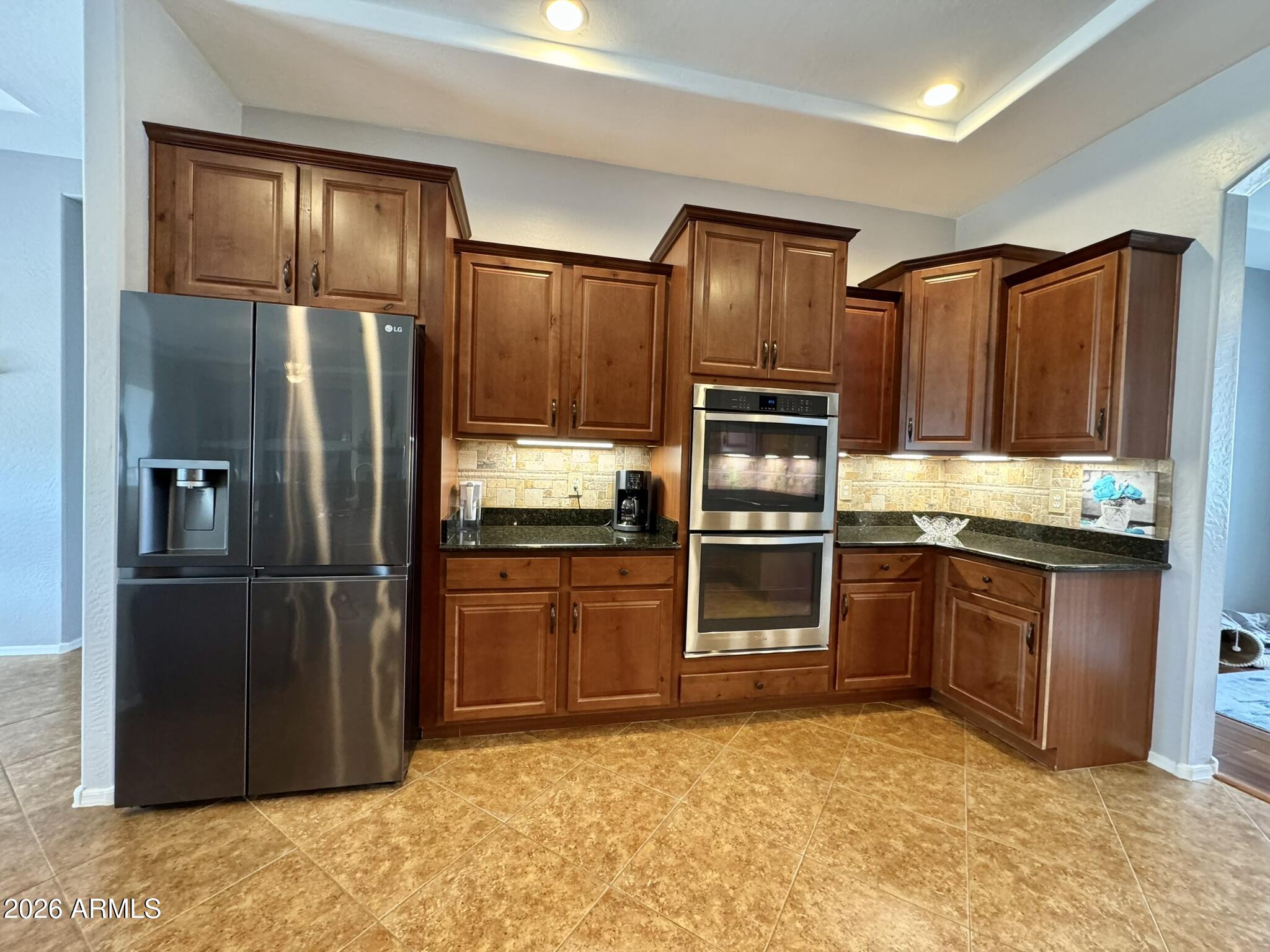 22909 West Sierra Ridge Way Wittmann, AZ 85361 - Photo 87 of 121 Doule Oven and SS Fridge