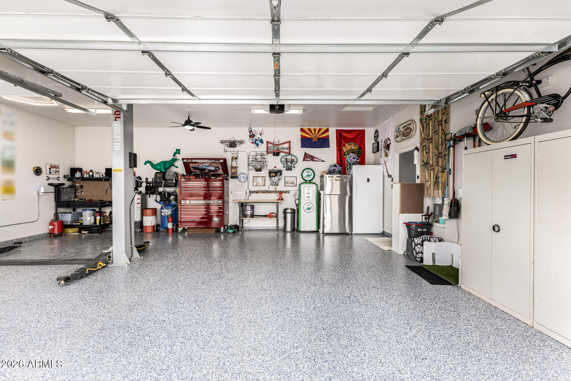 22909 West Sierra Ridge Way Wittmann, AZ 85361 - Photo 8 of 121 a view of a storage room