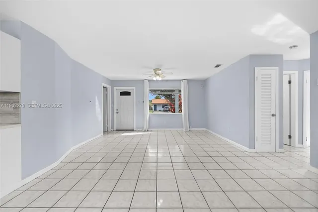 a view of an empty room and window