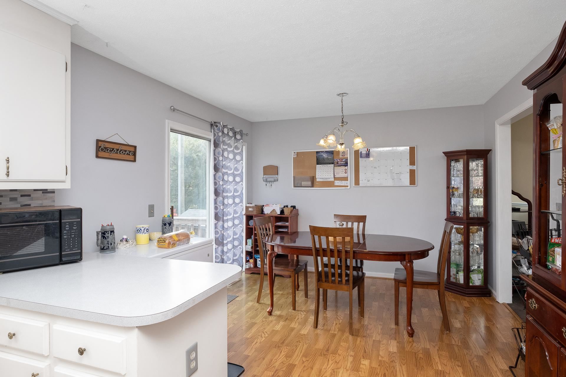 305 Ox Road Waynesboro, VA 22980 - Photo 12 of 28 a view of a dining room with furniture and wooden floor