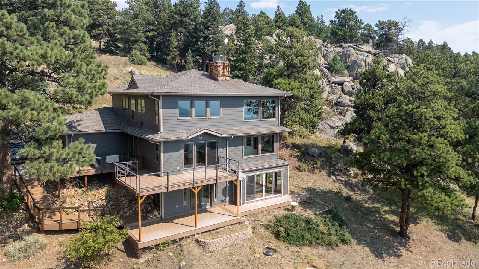 677 Sky Trail Road Boulder, CO 80302 - Photo 28 of 40 an aerial view of a house with a yard and balcony