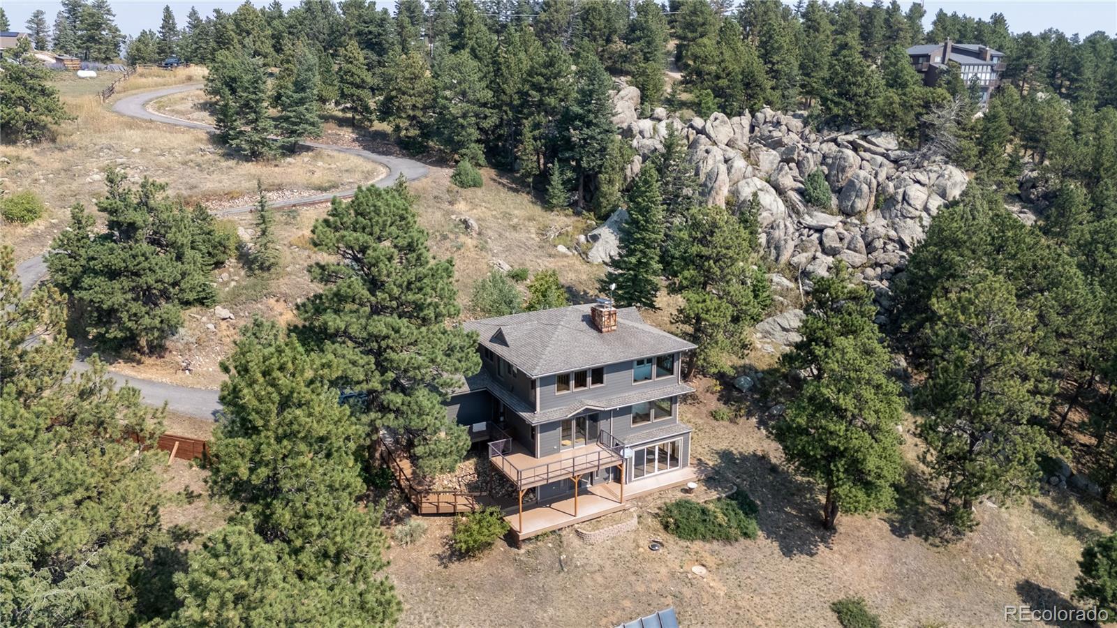 677 Sky Trail Road Boulder, CO 80302 - Photo 29 of 40 an aerial view of a house with a yard
