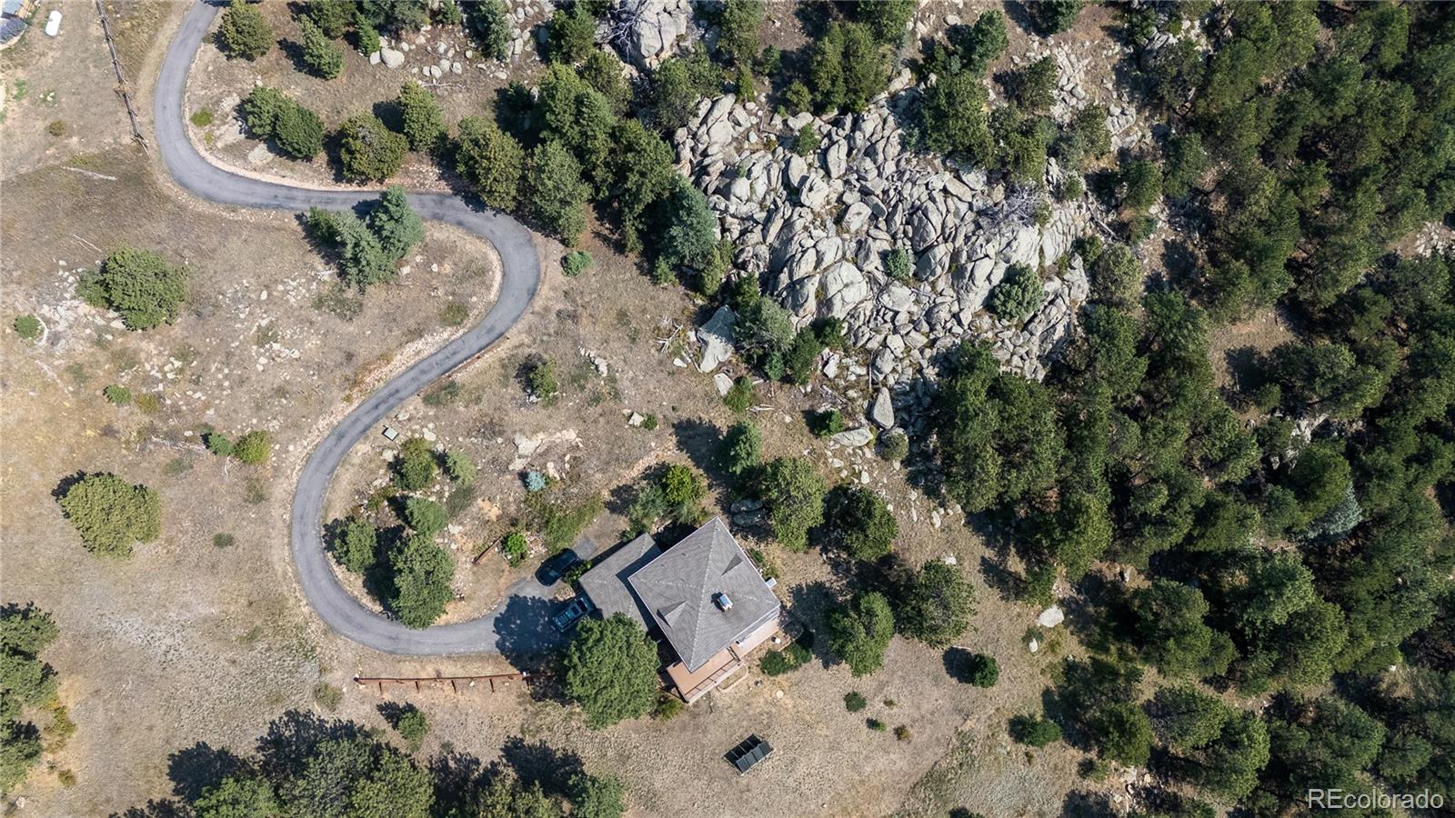 677 Sky Trail Road Boulder, CO 80302 - Photo 32 of 40 an aerial view of a house with a yard