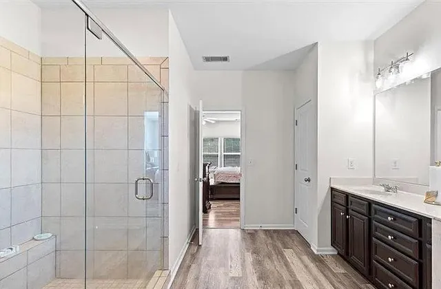 a bathroom with a bathtub and a sink