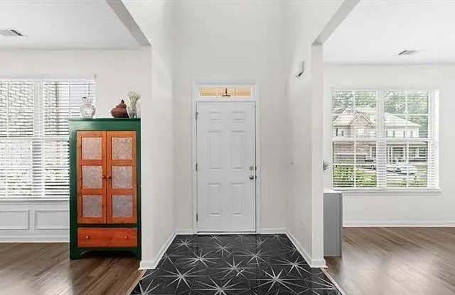 a bedroom with window