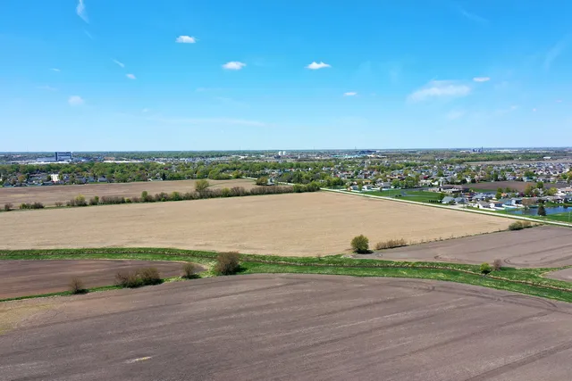 a view of a lake with a city