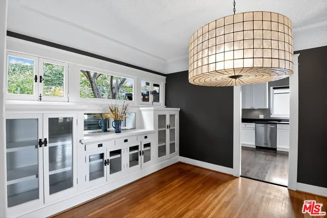 a view of a living room with a large window