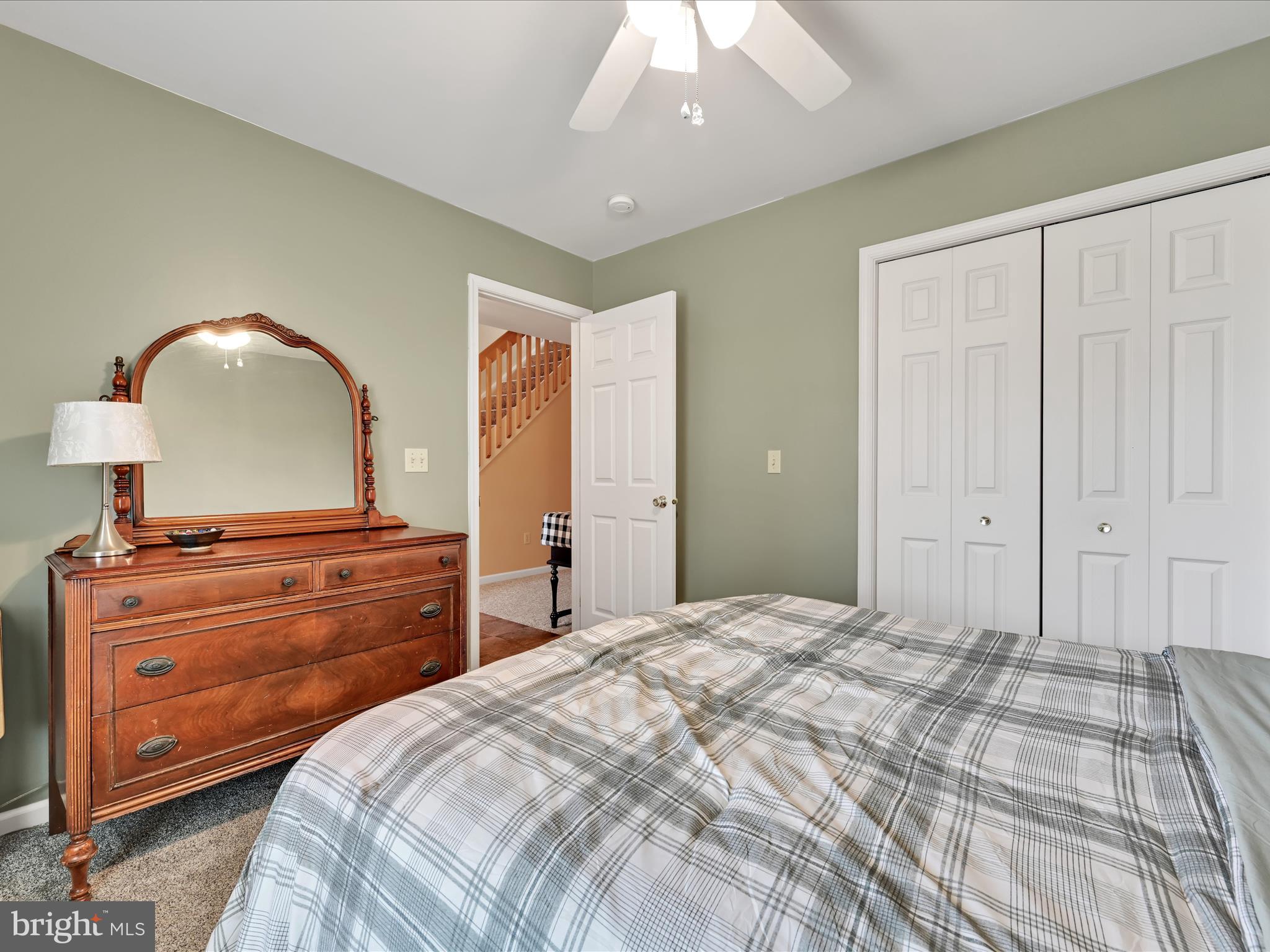 21 Silver Creek Road Lititz, PA 17543 - Photo 19 of 37 a bedroom with a bed and a dresser