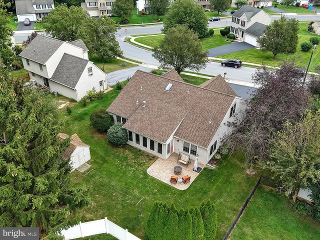 an aerial view of residential house with outdoor space