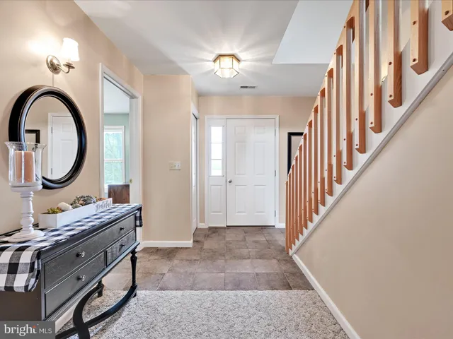 a view of a bathroom with dual sinks