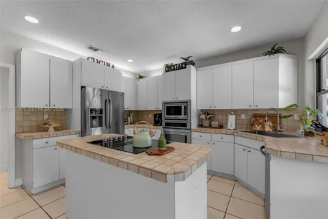 $1,575,000 | 12019 Southwest 77th Terrace, Miami, FL 33183