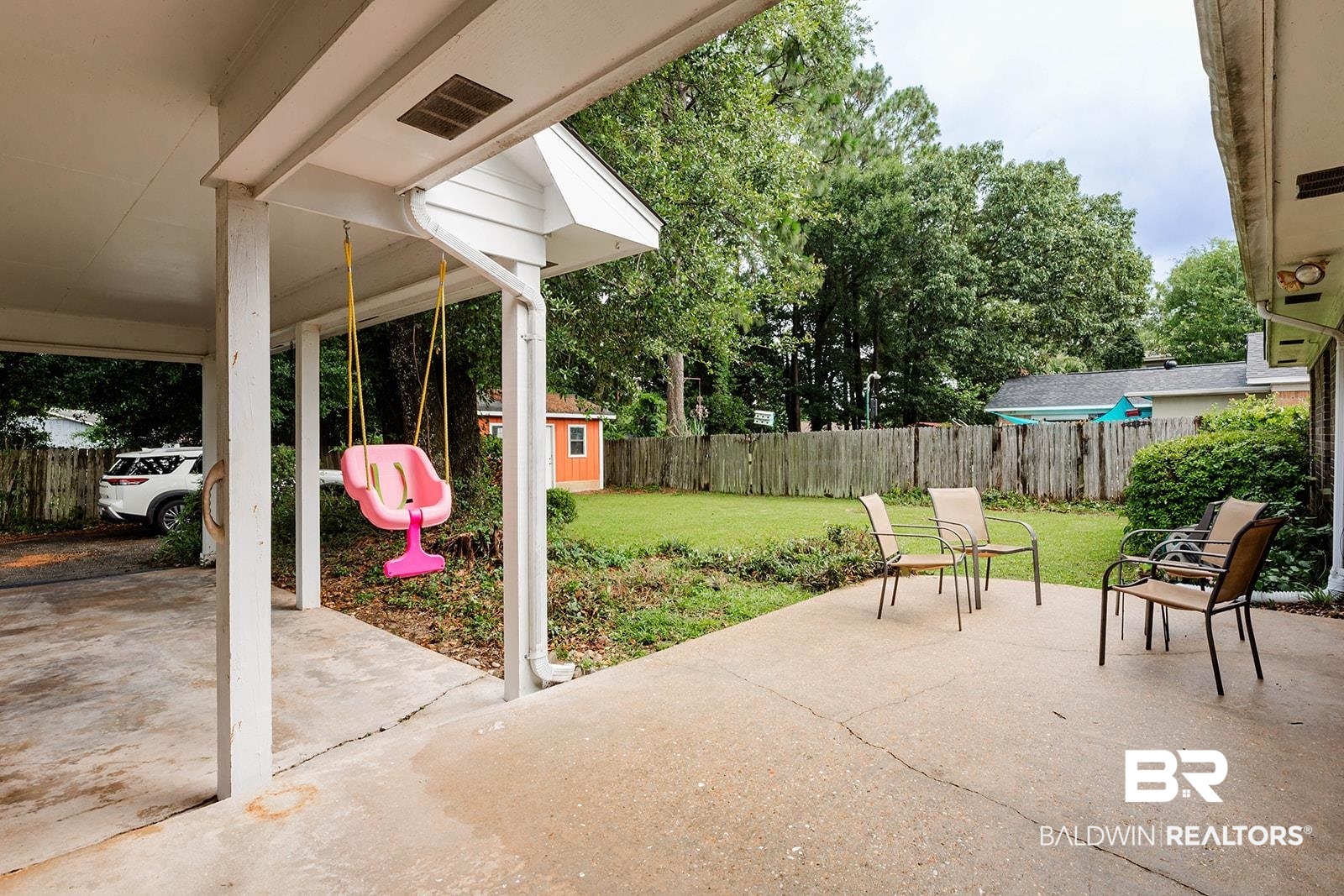 2920 Quail Creek Run Mobile, AL 36695 - Photo 32 of 33 Fenced backyard featuring a patio and an outdoor structure