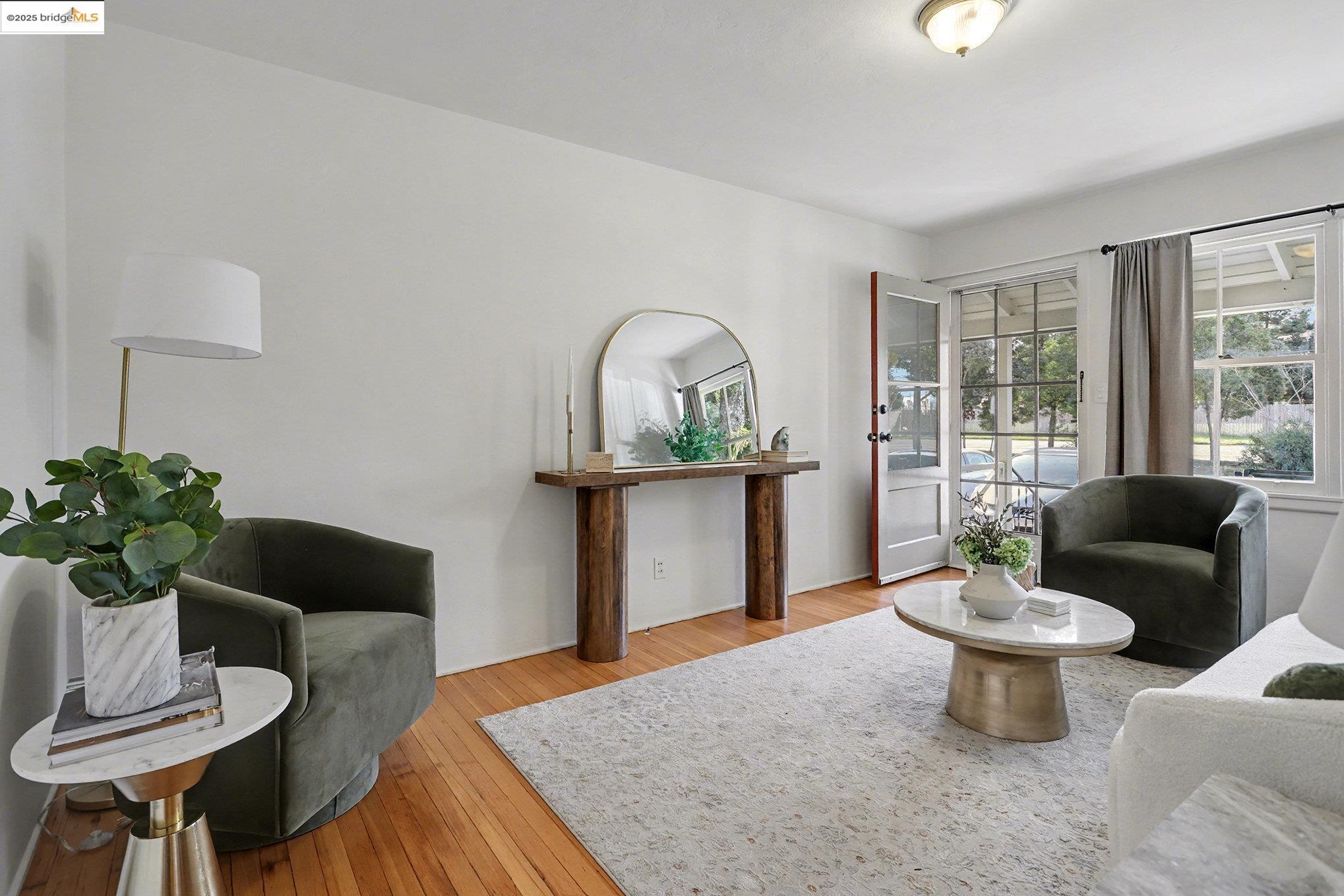 1808 Main Street Alameda, CA 94501 - Photo 7 of 18 a living room with furniture and a potted plant