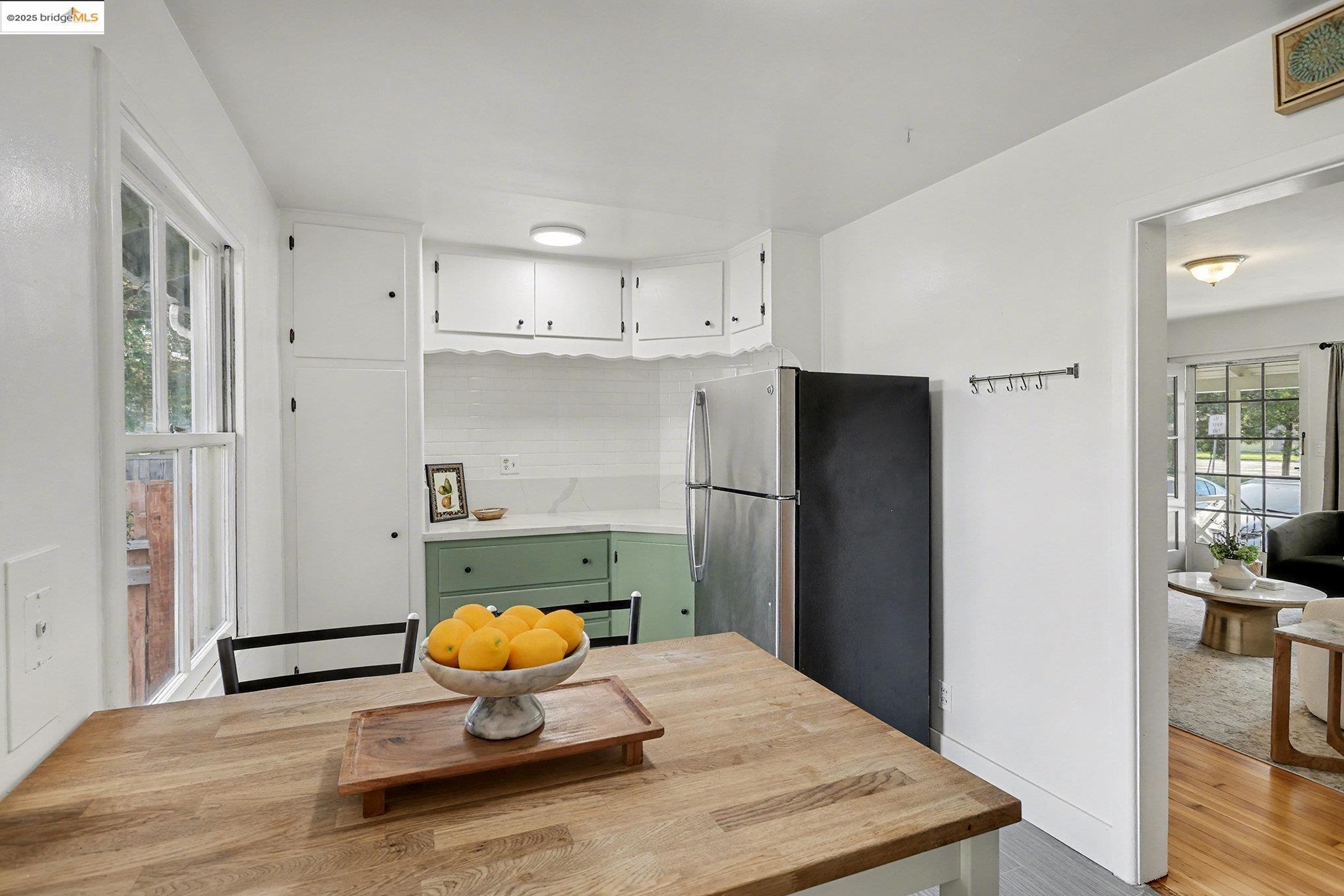 1808 Main Street Alameda, CA 94501 - Photo 9 of 18 a bedroom with a bed and wooden floor