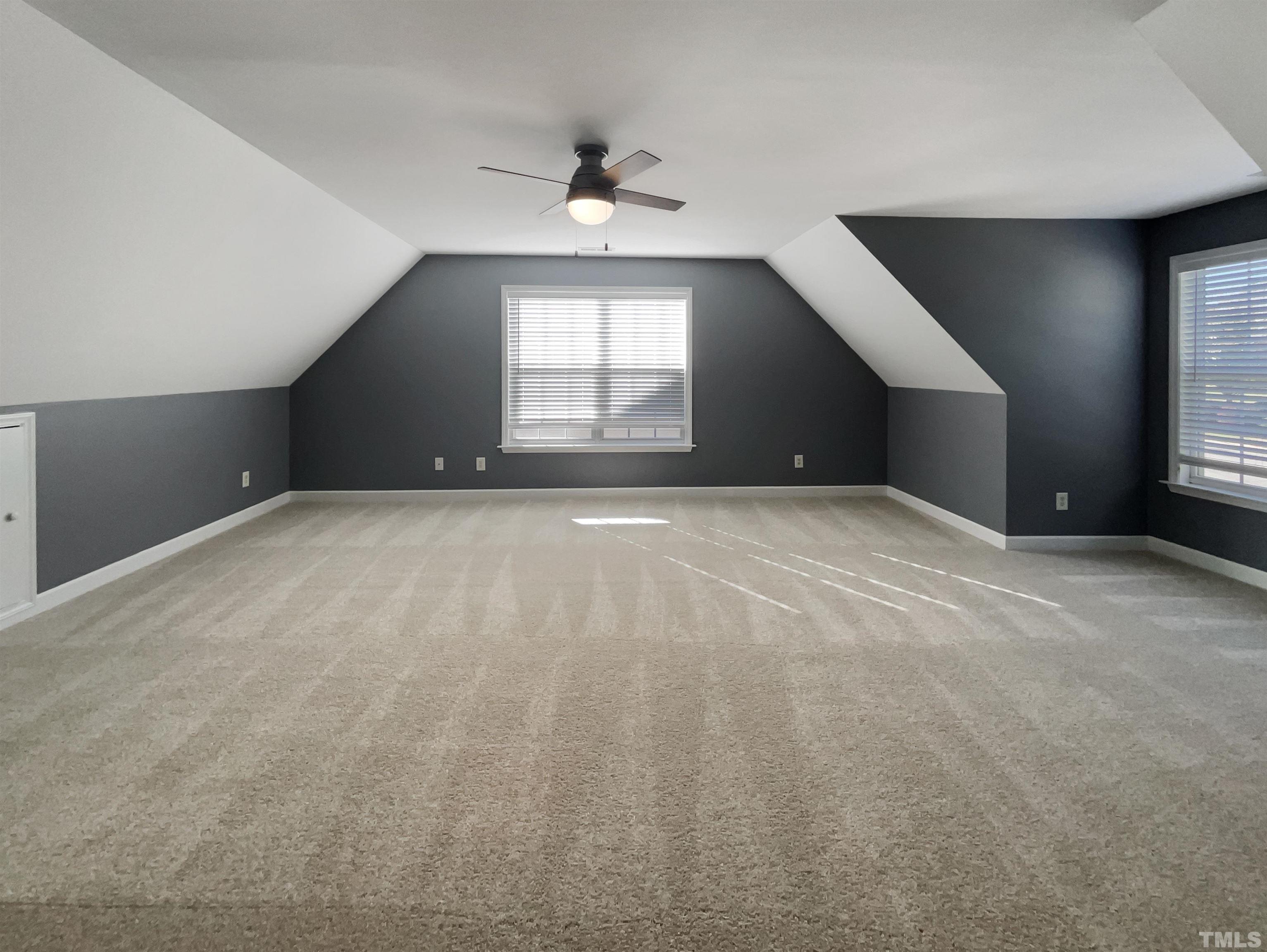 537 Seastone Street Raleigh, NC 27603 - Photo 17 of 25 a view of an empty room with a window