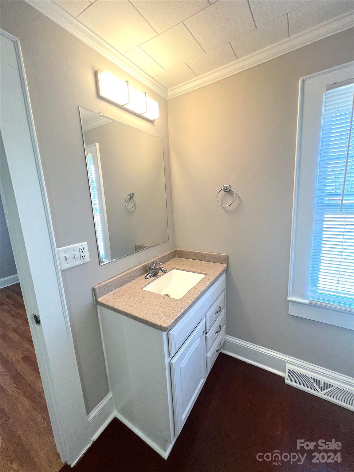 645 Bostian Road China Grove, NC 28023 - Photo 12 of 17 a bathroom with a sink and mirror