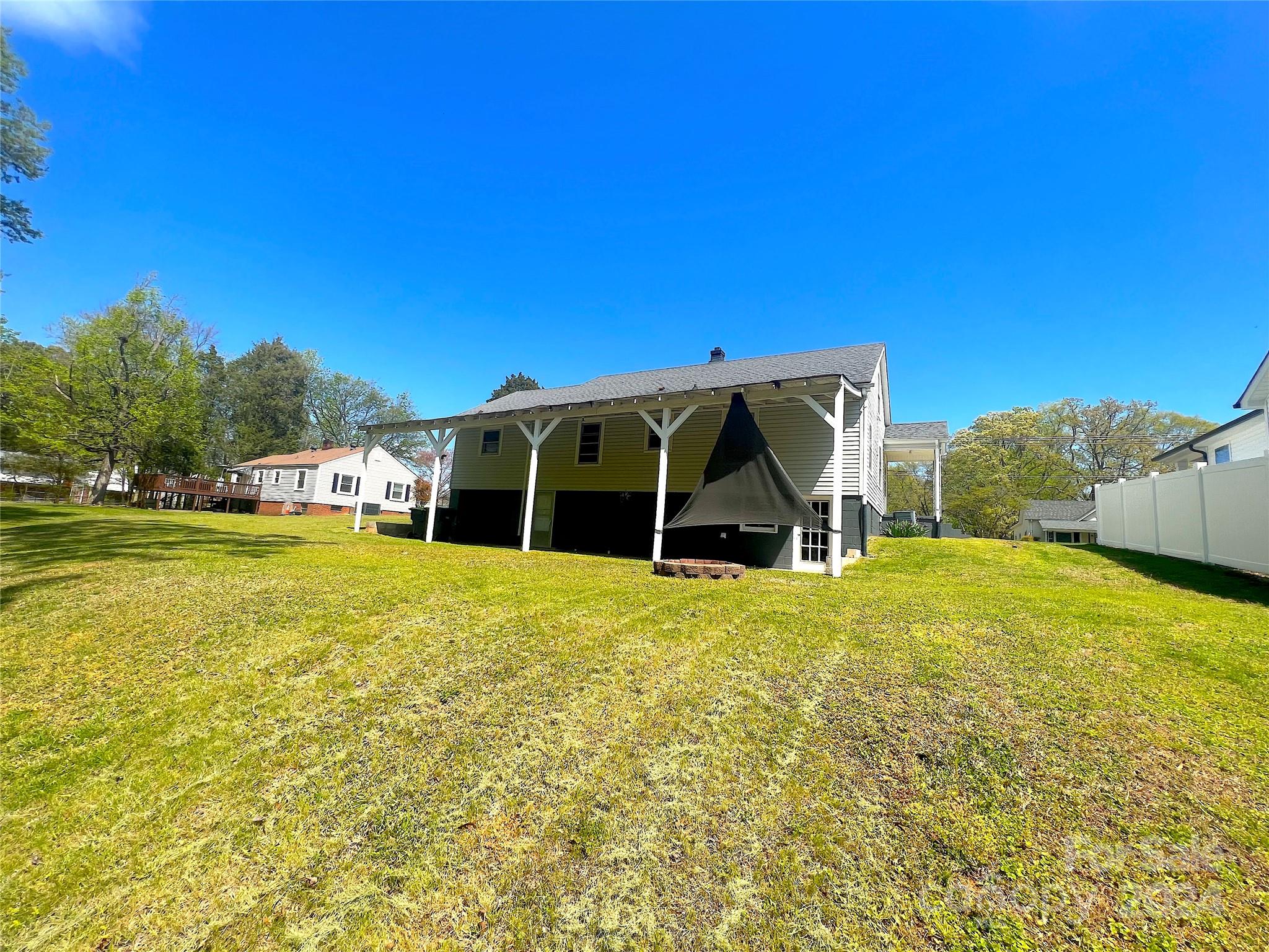 645 Bostian Road China Grove, NC 28023 - Photo 3 of 17 a view of a house with a yard