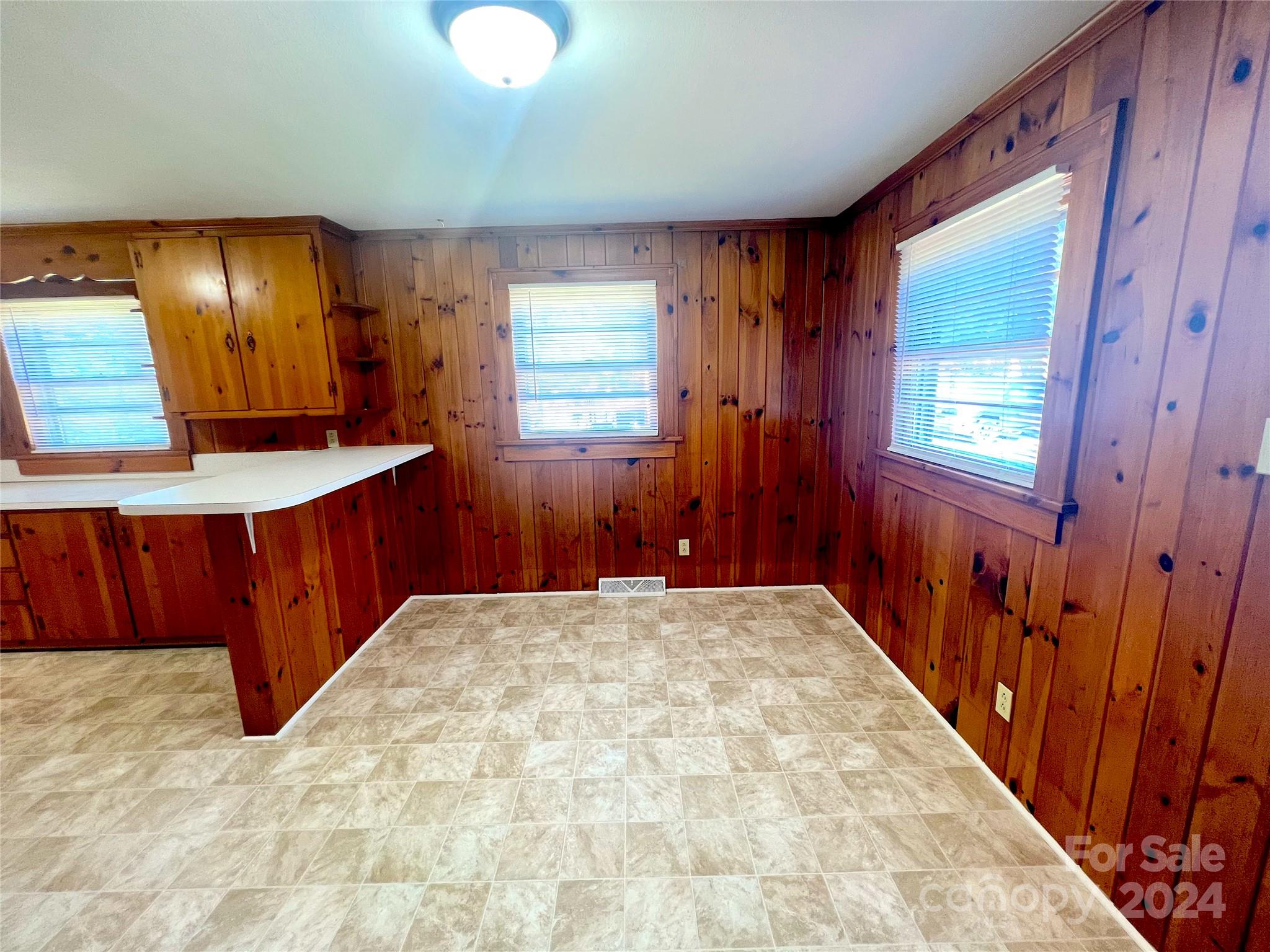 645 Bostian Road China Grove, NC 28023 - Photo 7 of 17 a spacious bathroom with a double vanity sink and a mirror