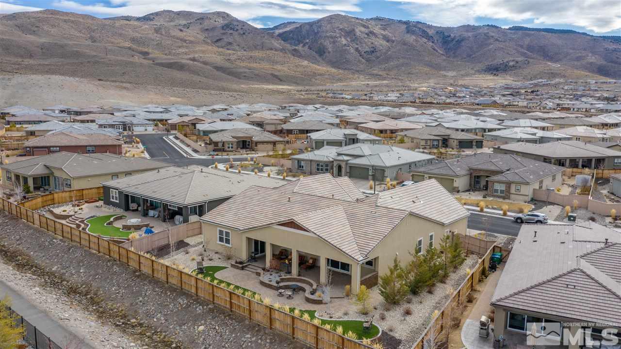9745 Cardigan Bay Lane Reno, NV 89521 - Photo 23 of 25 an aerial view of a house with a mountain