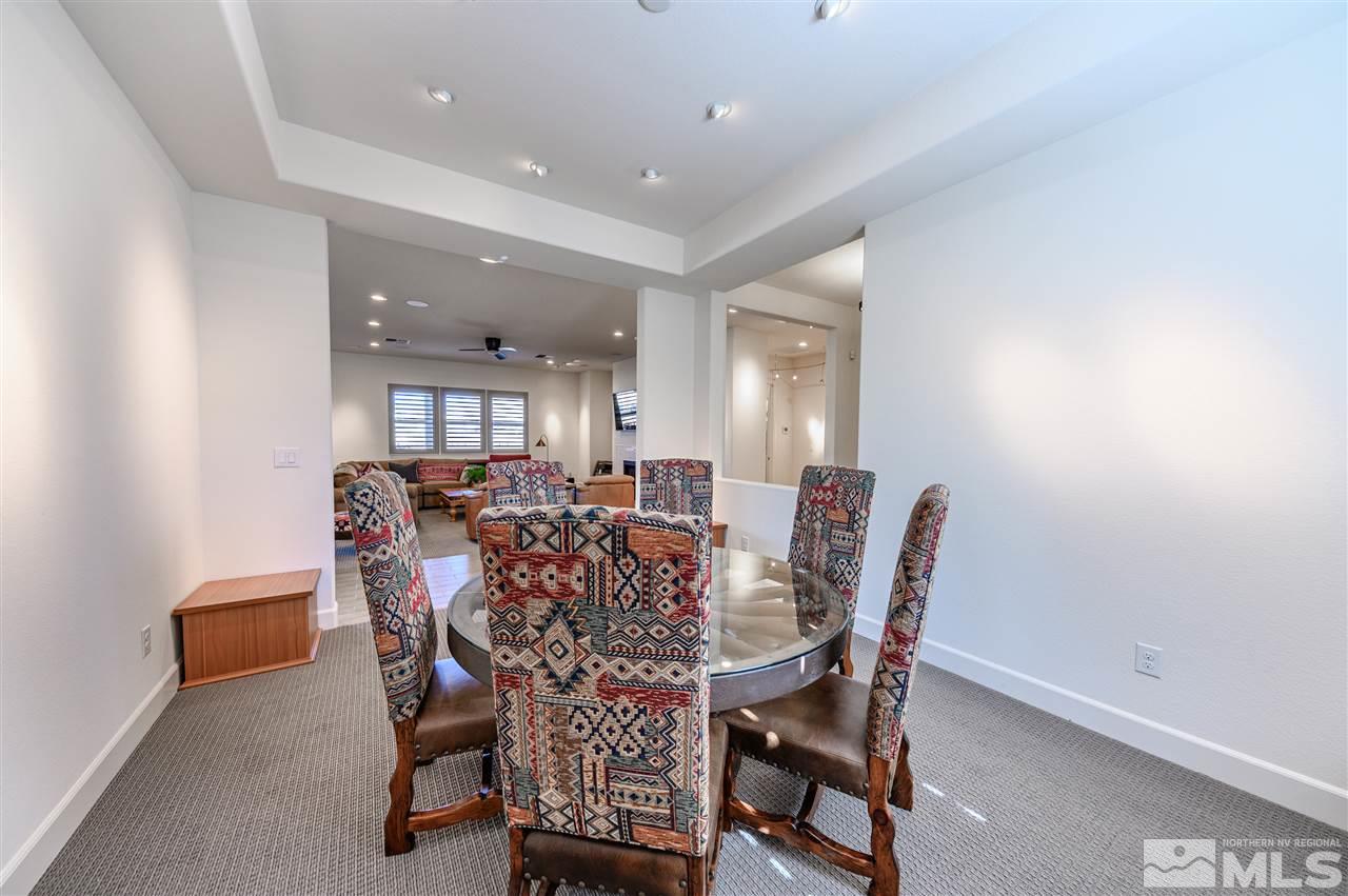 9745 Cardigan Bay Lane Reno, NV 89521 - Photo 4 of 25 a view of a dining room with furniture