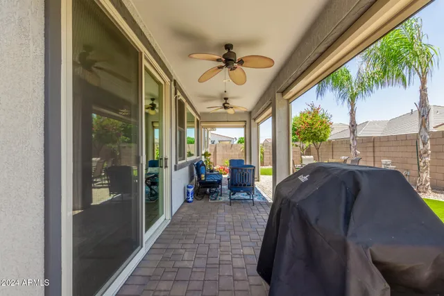 a living room filled with furniture and a garden