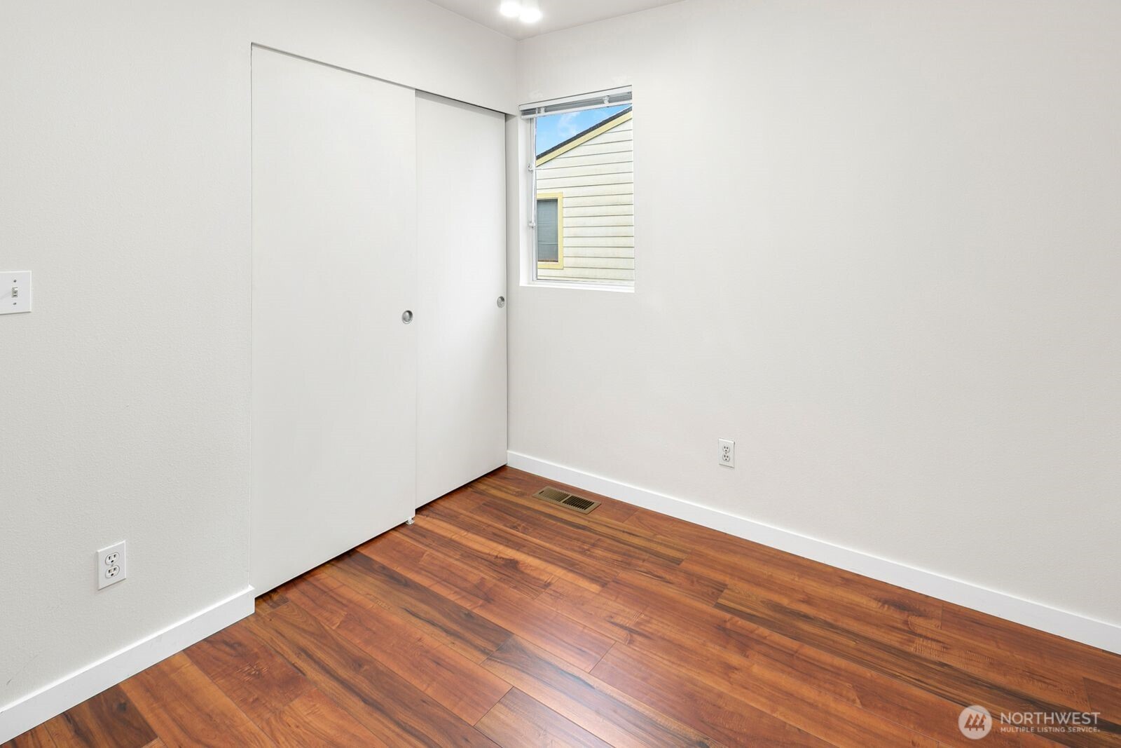 2367 South Forest Street Seattle, WA 98144 - Photo 15 of 33 a view of an empty room with wooden floor and a window