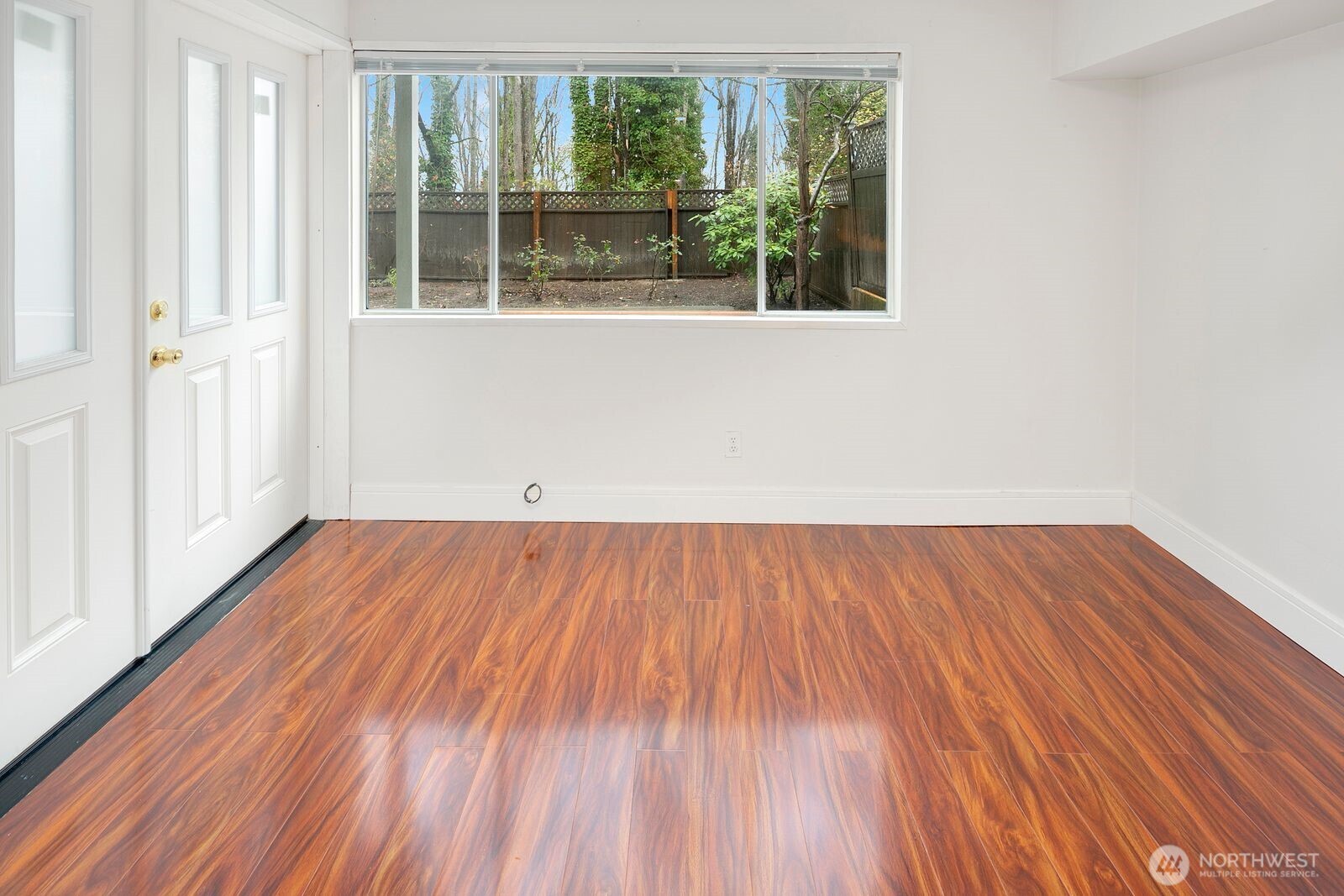 2367 South Forest Street Seattle, WA 98144 - Photo 16 of 33 an empty room with wooden floor and windows