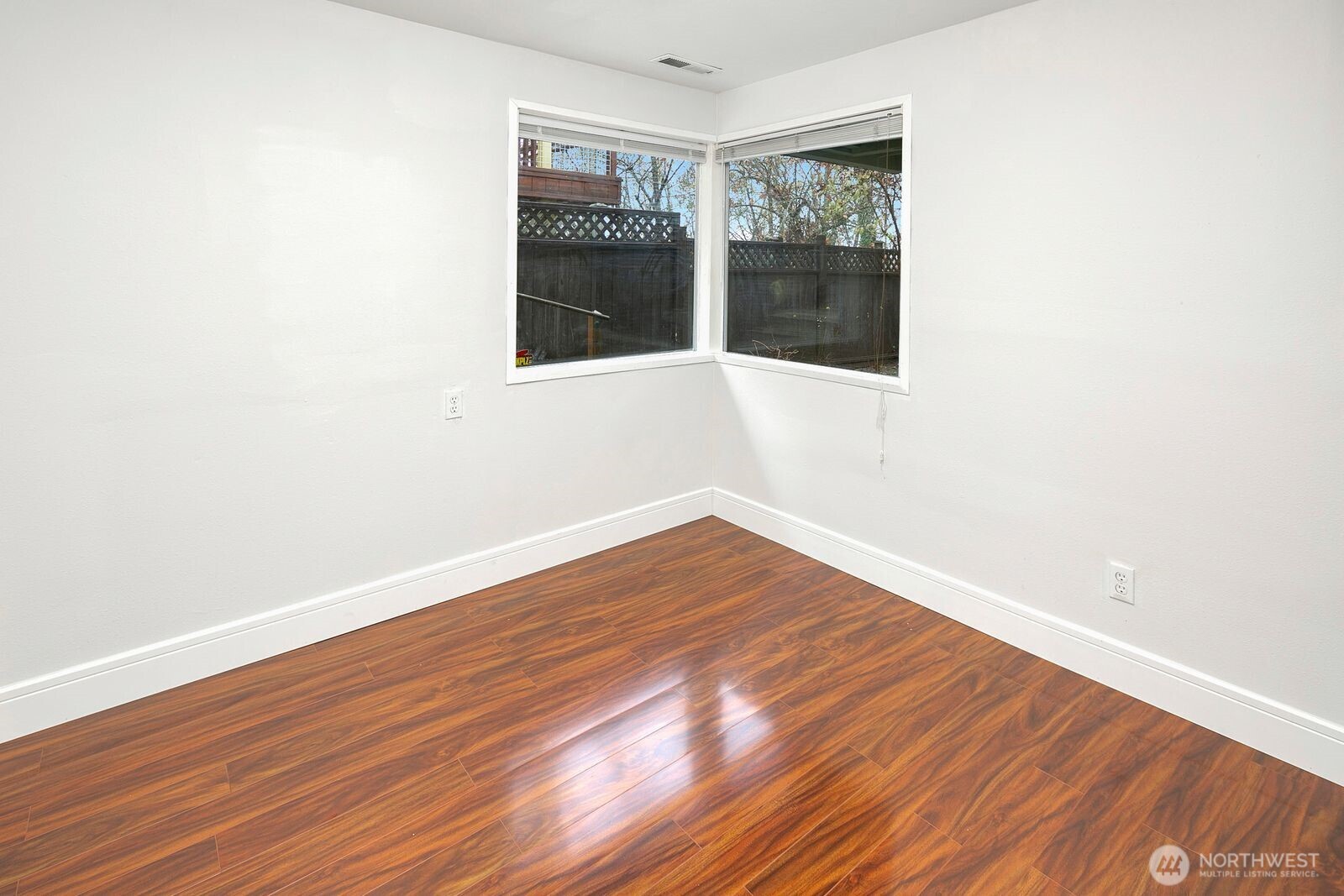 2367 South Forest Street Seattle, WA 98144 - Photo 22 of 33 a view of an empty room with wooden floor and a window