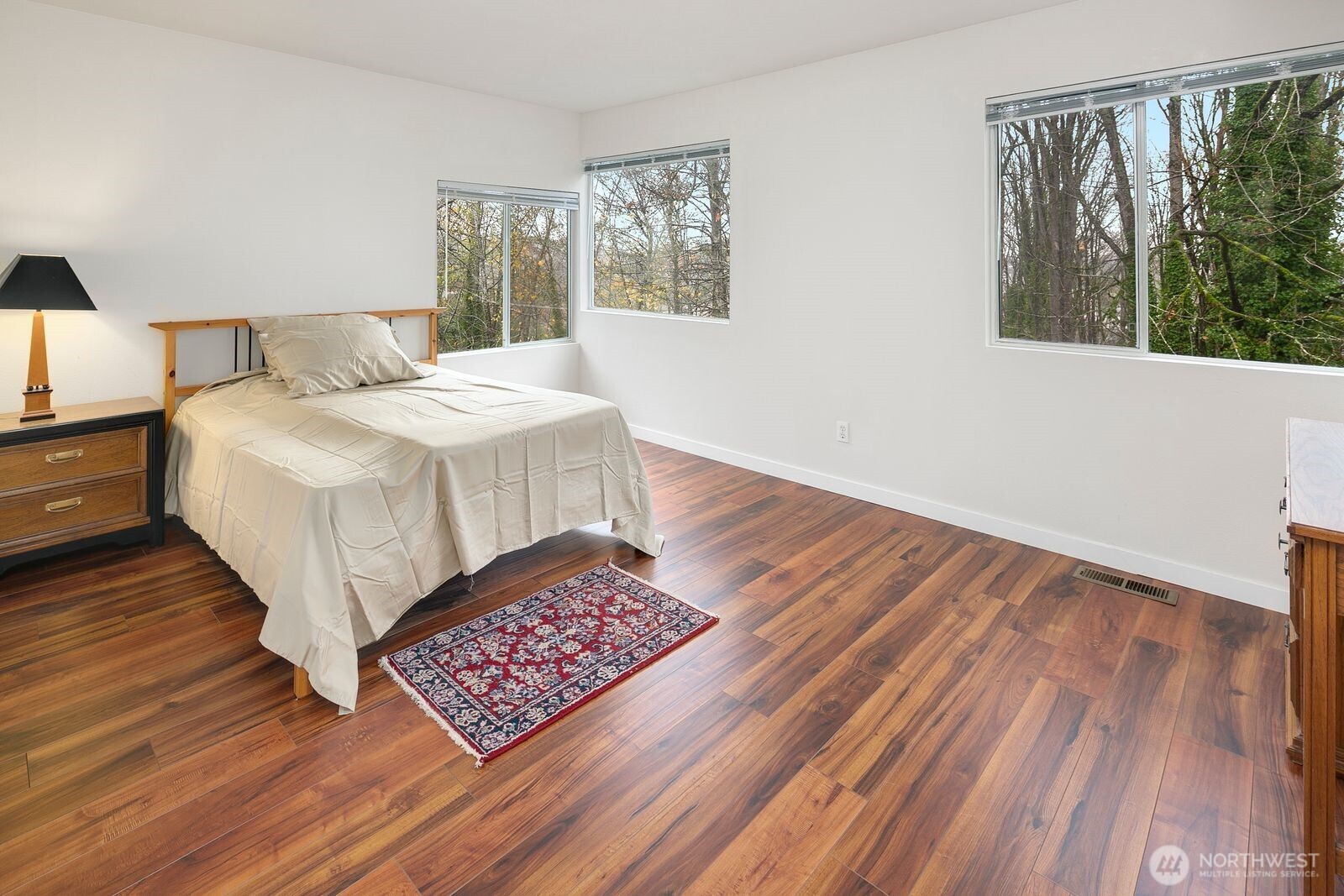 2367 South Forest Street Seattle, WA 98144 - Photo 8 of 33 a large bed sitting in a bedroom next to a window