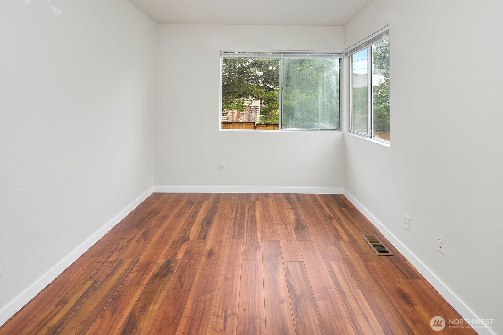 2367 South Forest Street Seattle, WA 98144 - Photo 10 of 33 a view of an empty room with wooden floor and a window