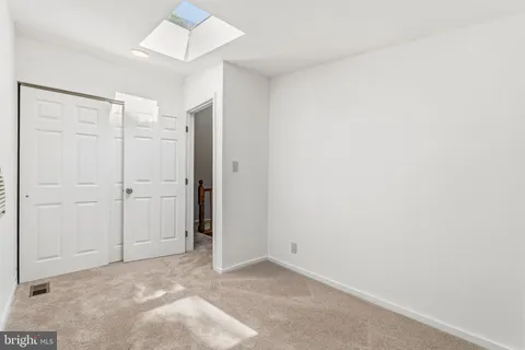 an empty room with a natural light