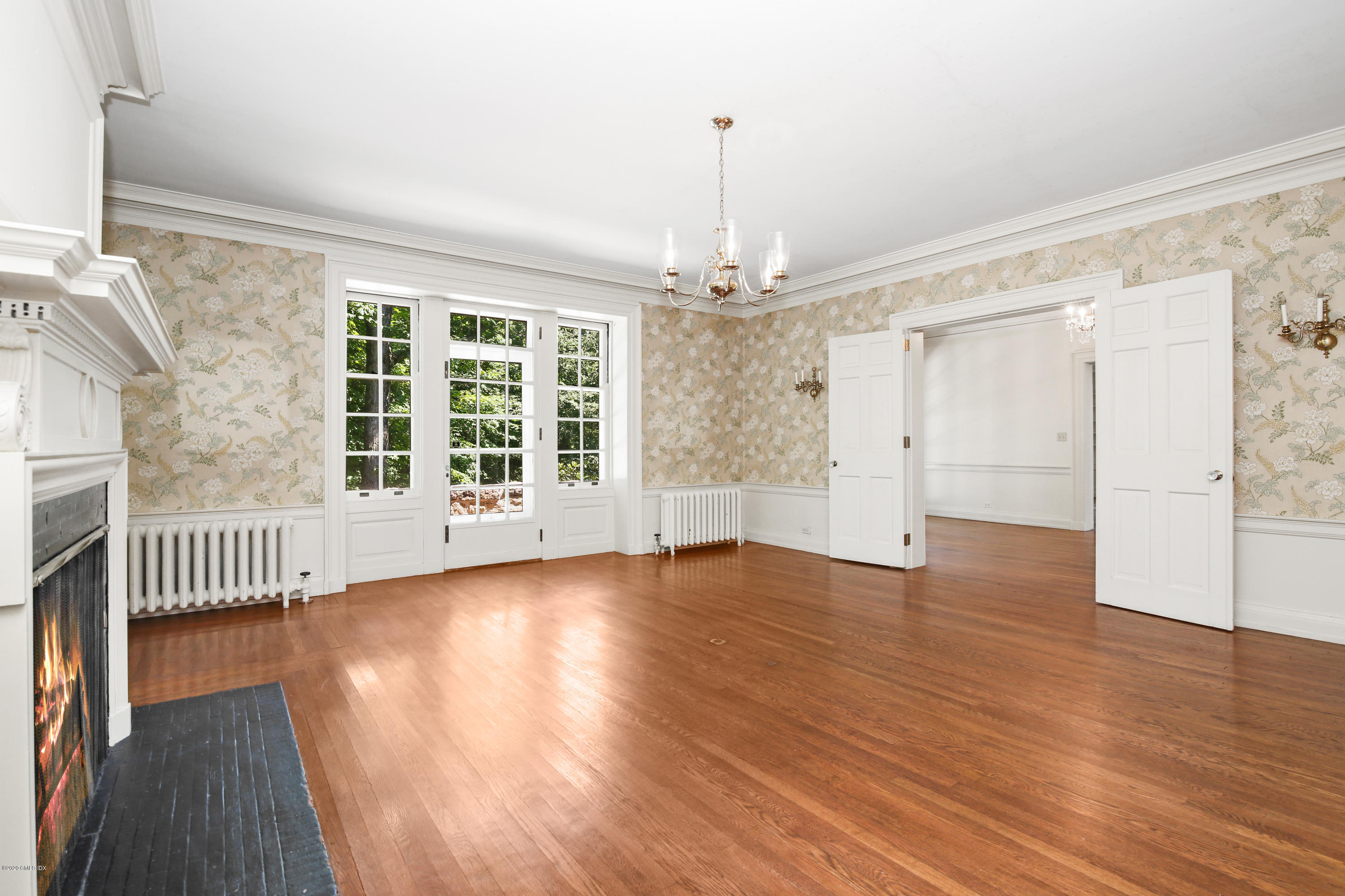 51 Doubling Road Greenwich, CT 06830 - Photo 8 of 24 a view of empty room with wooden floor and fan