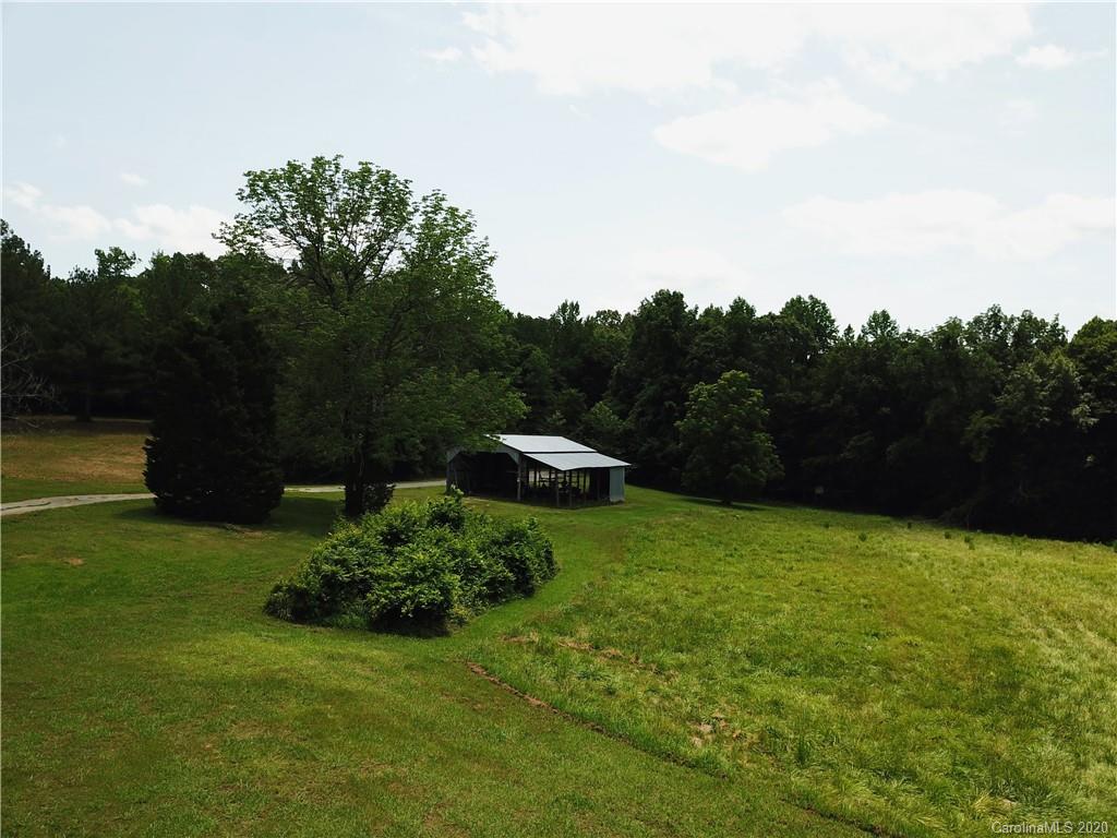 3591 Hughes Road Clover, SC 29710 - Photo 34 of 40 a backyard of a house with lots of green space
