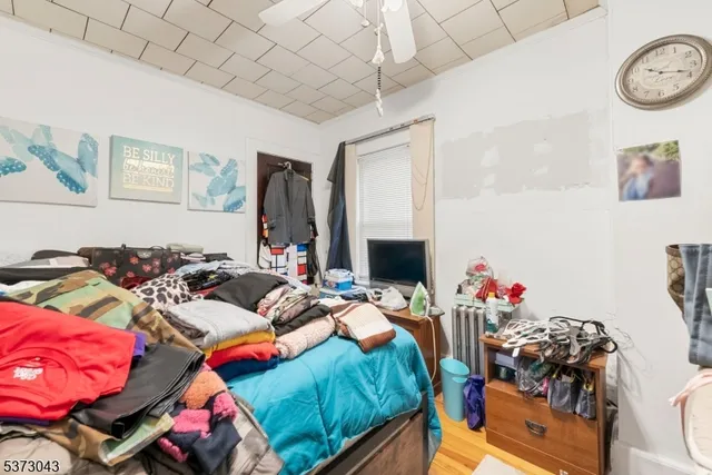 a bedroom with furniture and a bed