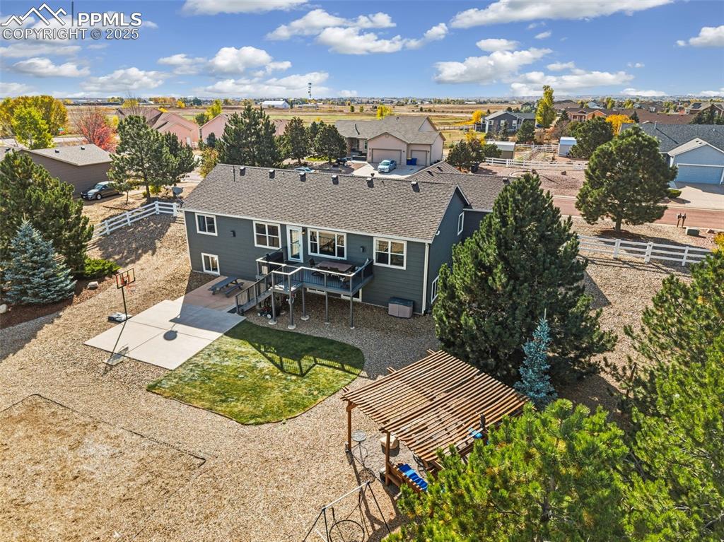 8449 Copenhagen Road Peyton, CO 80831 - Photo 12 of 49 an aerial view of a house with garden space and ocean view