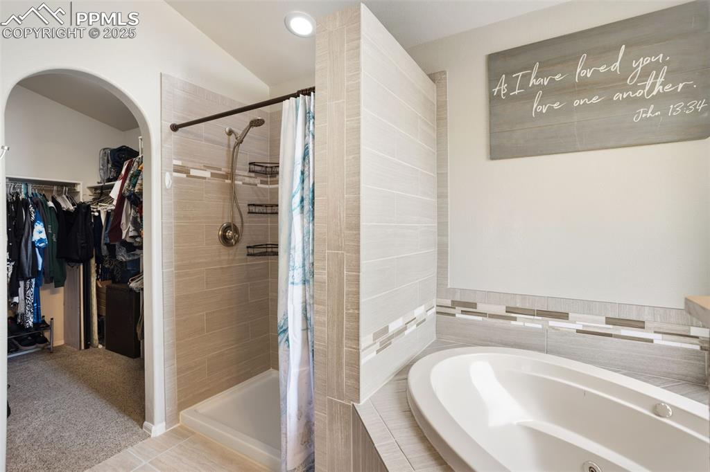 8449 Copenhagen Road Peyton, CO 80831 - Photo 26 of 49 a bathroom with a sink and a shower