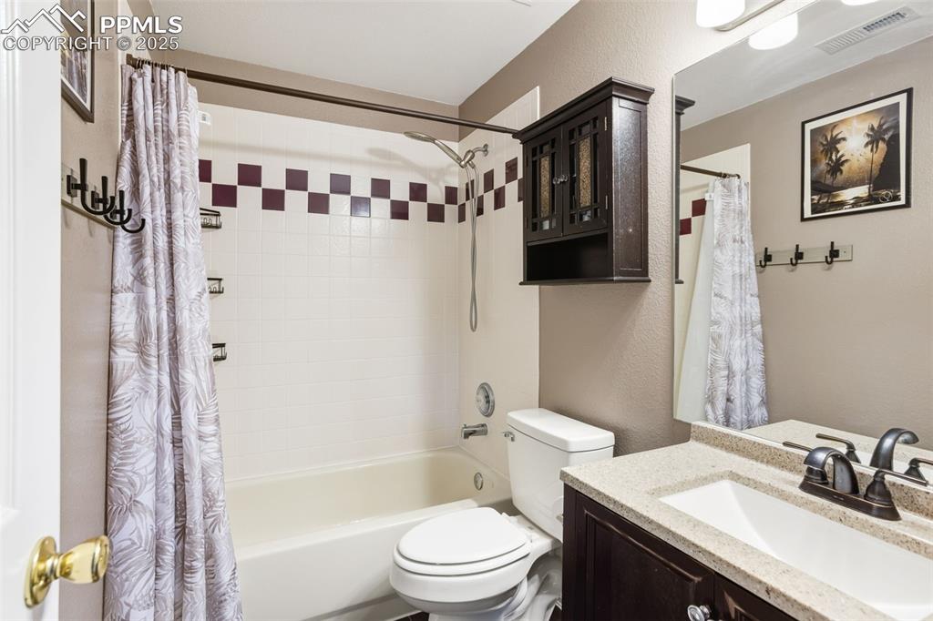8449 Copenhagen Road Peyton, CO 80831 - Photo 38 of 49 a bathroom with a sink toilet and shower