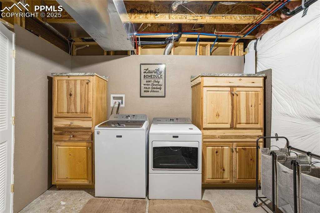 8449 Copenhagen Road Peyton, CO 80831 - Photo 40 of 49 a utility room with dryer and washer