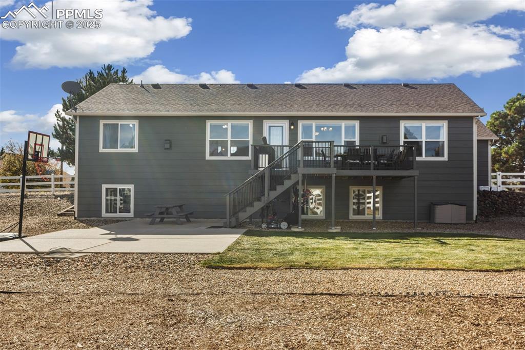 8449 Copenhagen Road Peyton, CO 80831 - Photo 44 of 49 a view of a house with a patio