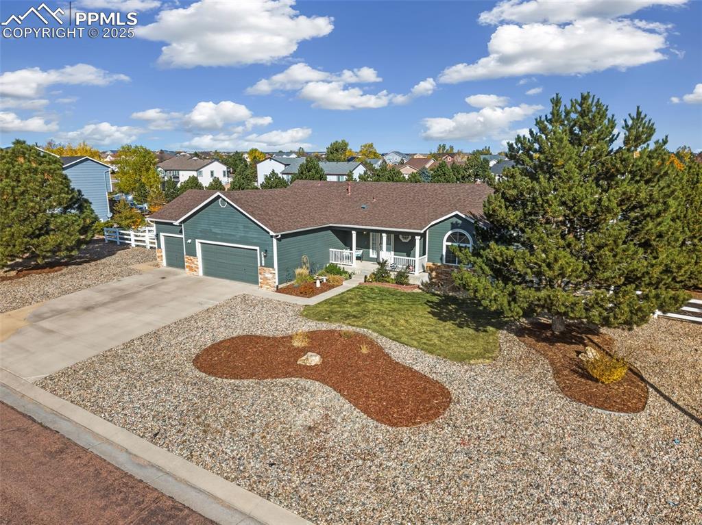 8449 Copenhagen Road Peyton, CO 80831 - Photo 5 of 49 front view of house with a yard