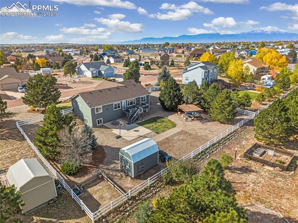 8449 Copenhagen Road Peyton, CO 80831 - Photo 9 of 49 an aerial view of residential houses with outdoor space