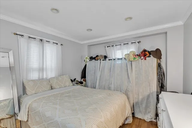 a bedroom with a bed and a closet