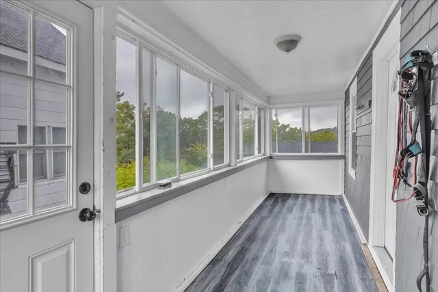 a view of a room with a large window