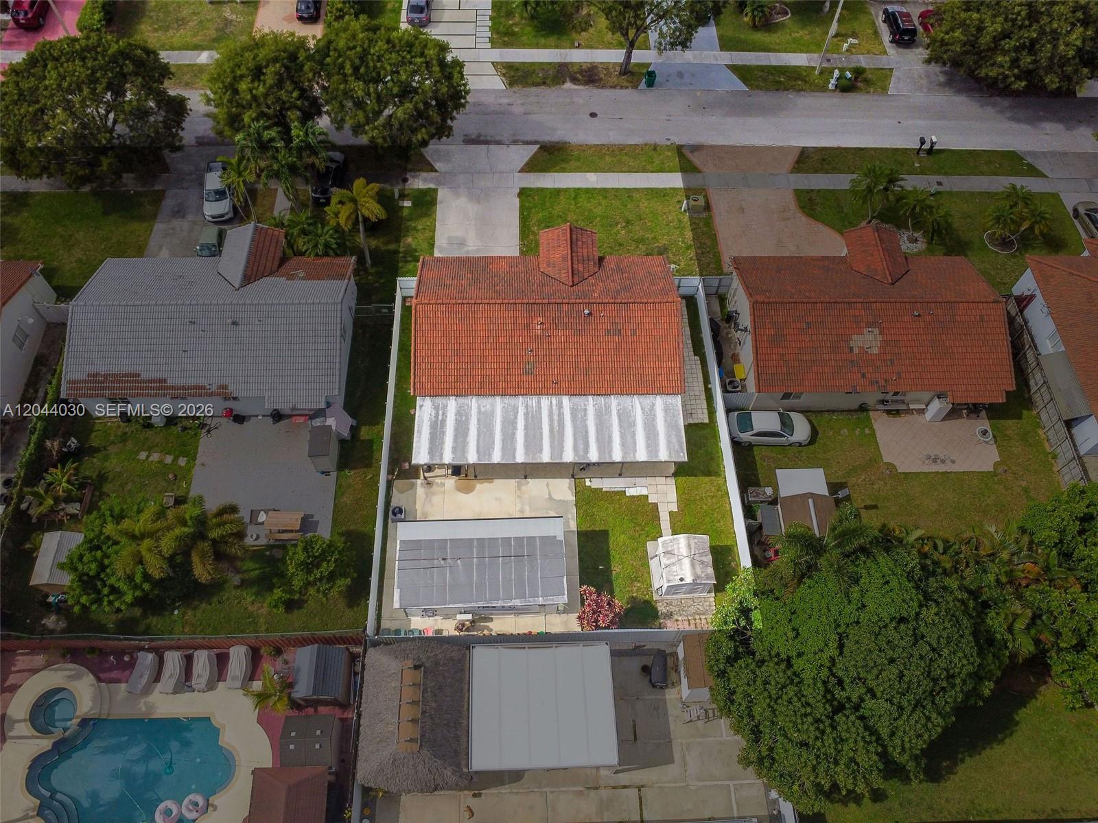 12551 Southwest 223rd Street Miami, FL 33170 - Photo 34 of 35 an aerial view of houses with outdoor space