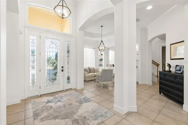 a view of a dining room and chandelier