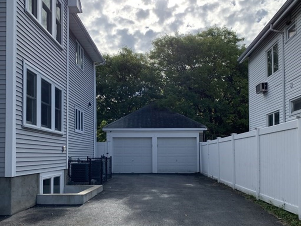19 Foster Street, Unit 19 Arlington, MA 02474 - Photo 33 of 33 a house view with a outdoor space